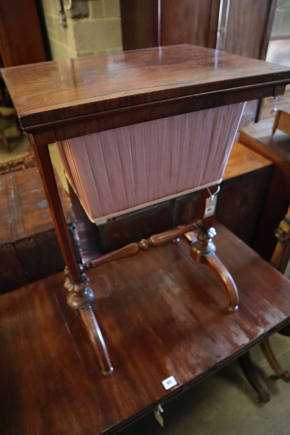 An early Victorian rosewood work table, width 48cm
